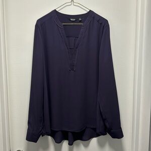 Dark purple, v-neck, long sleeve blouse.